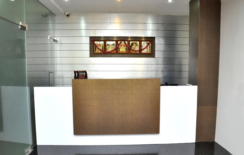 Hotel The Home Tiruppur Bagian luar foto