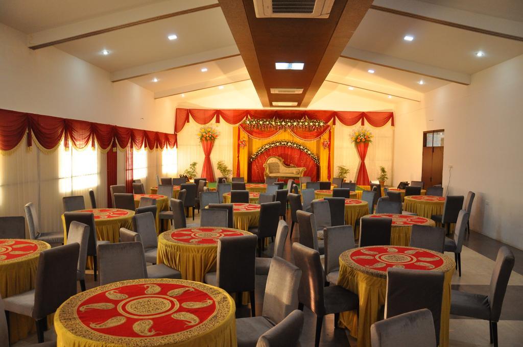 Hotel The Home Tiruppur Bagian luar foto