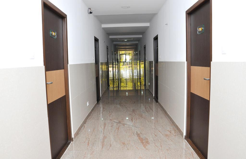 Hotel The Home Tiruppur Ruang foto