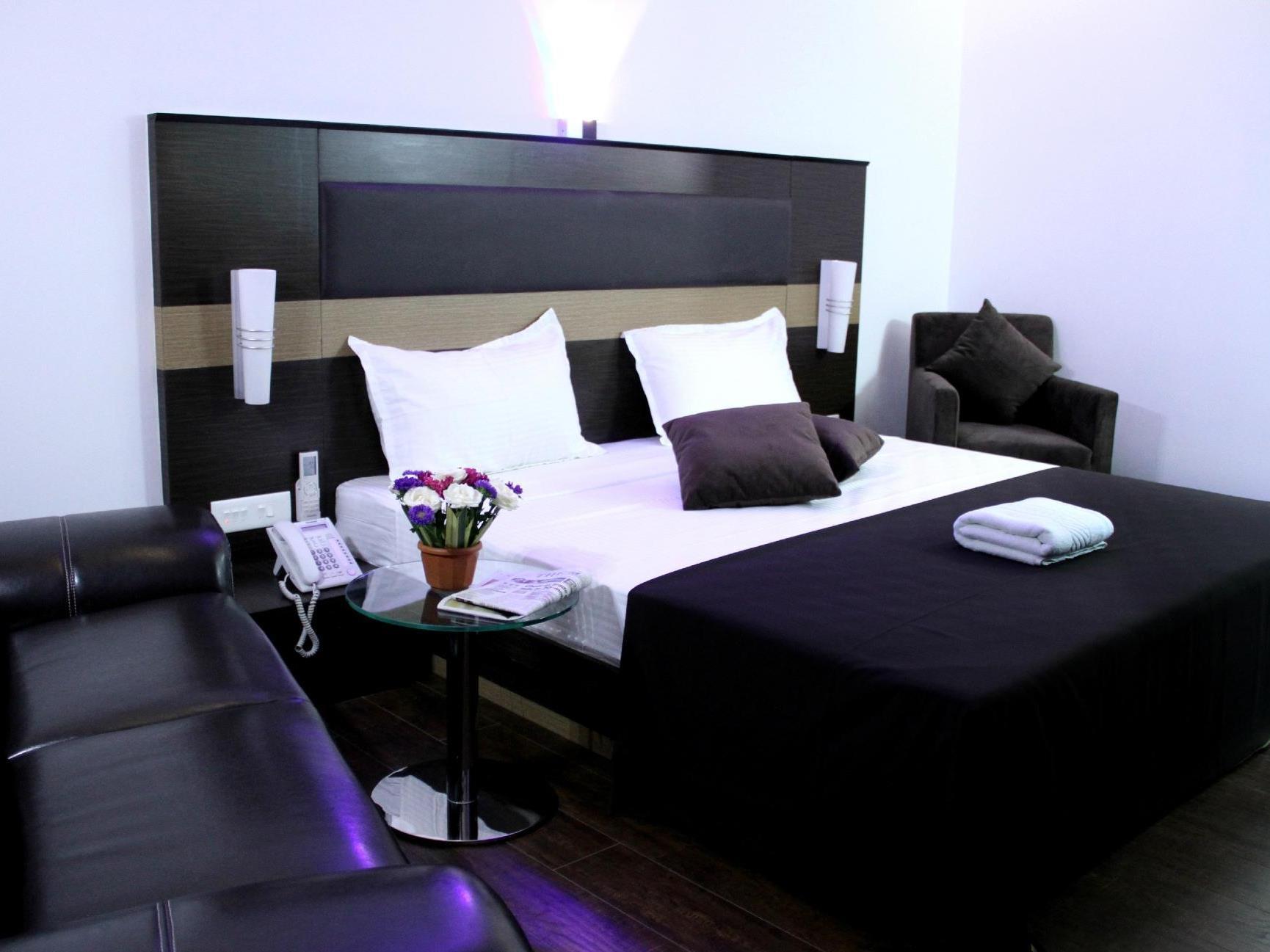 Hotel The Home Tiruppur Bagian luar foto