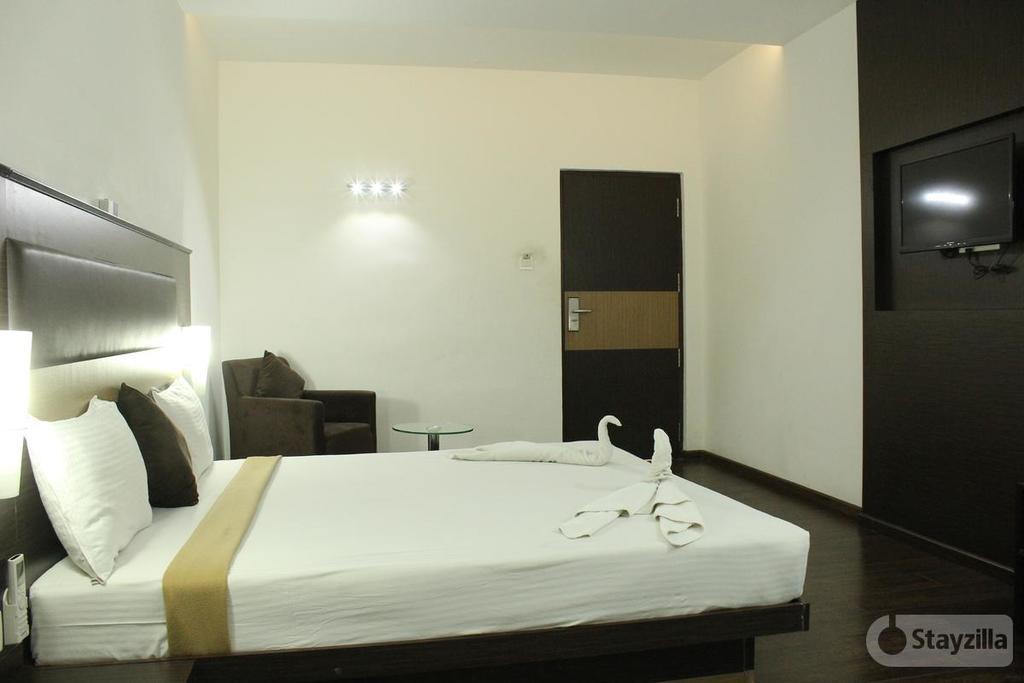 Hotel The Home Tiruppur Bagian luar foto