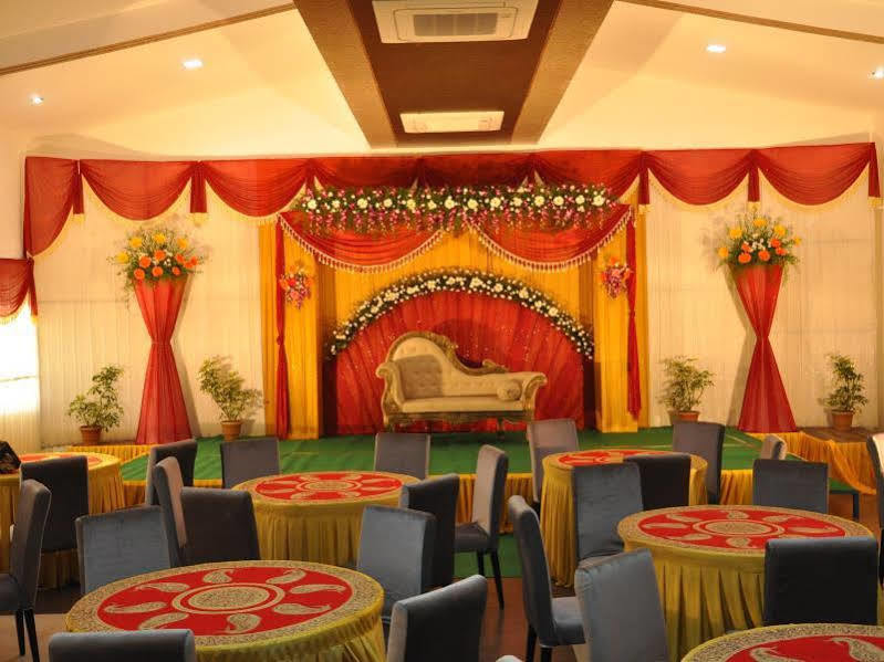 Hotel The Home Tiruppur Bagian luar foto